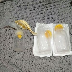 Medela Manual Handpump and bottles pre-owned